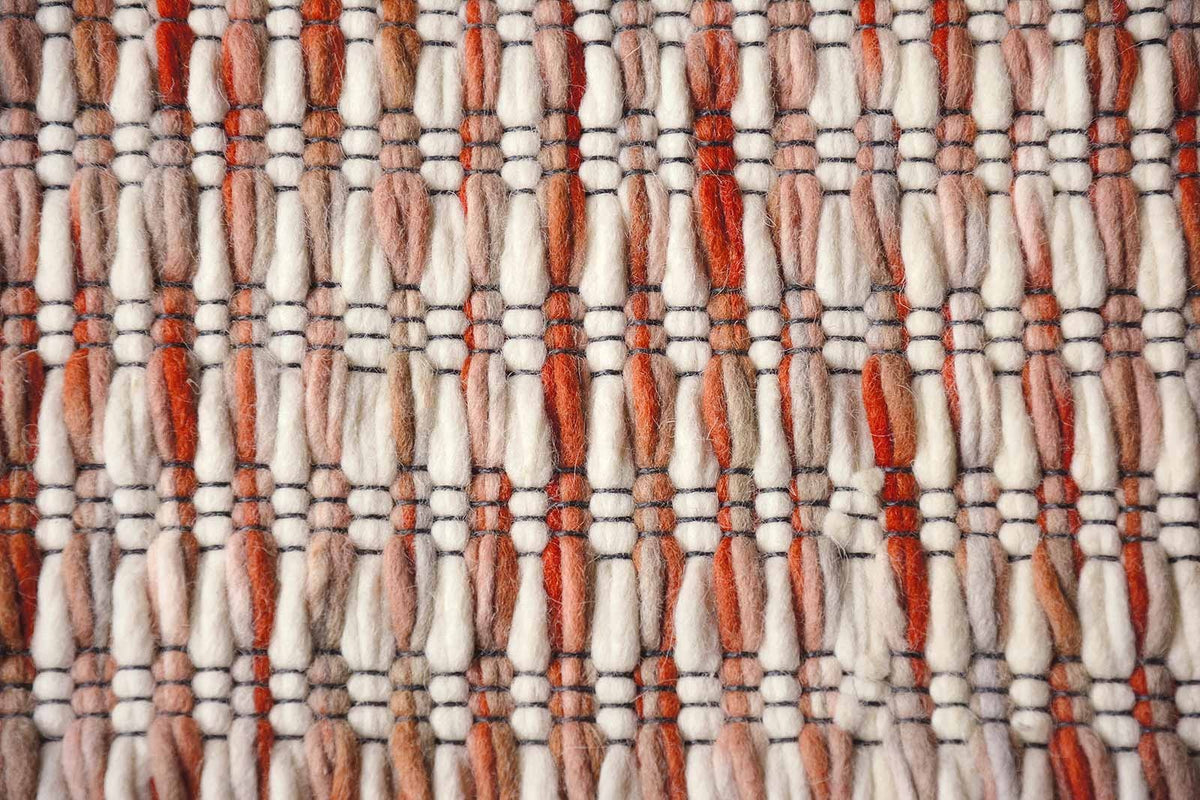 Brink & Campman Grain Coral vloerkleed close-up van de structuur