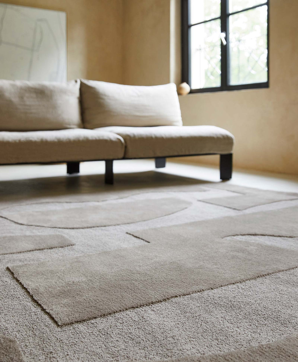 Brink & Campman Mural Bold Cement vloerkleed in een interieur