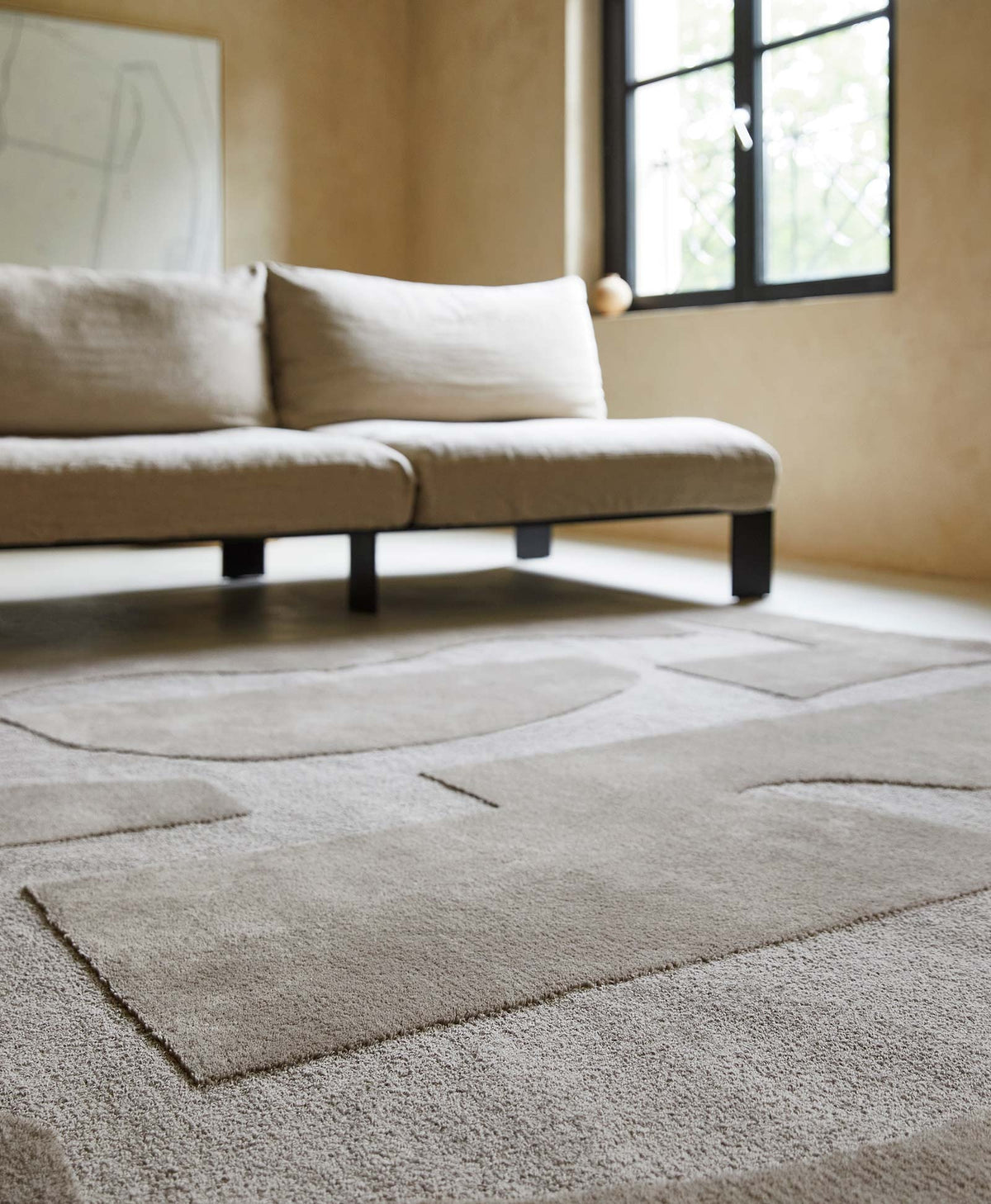 Brink & Campman Mural Bold Cement vloerkleed in een interieur
