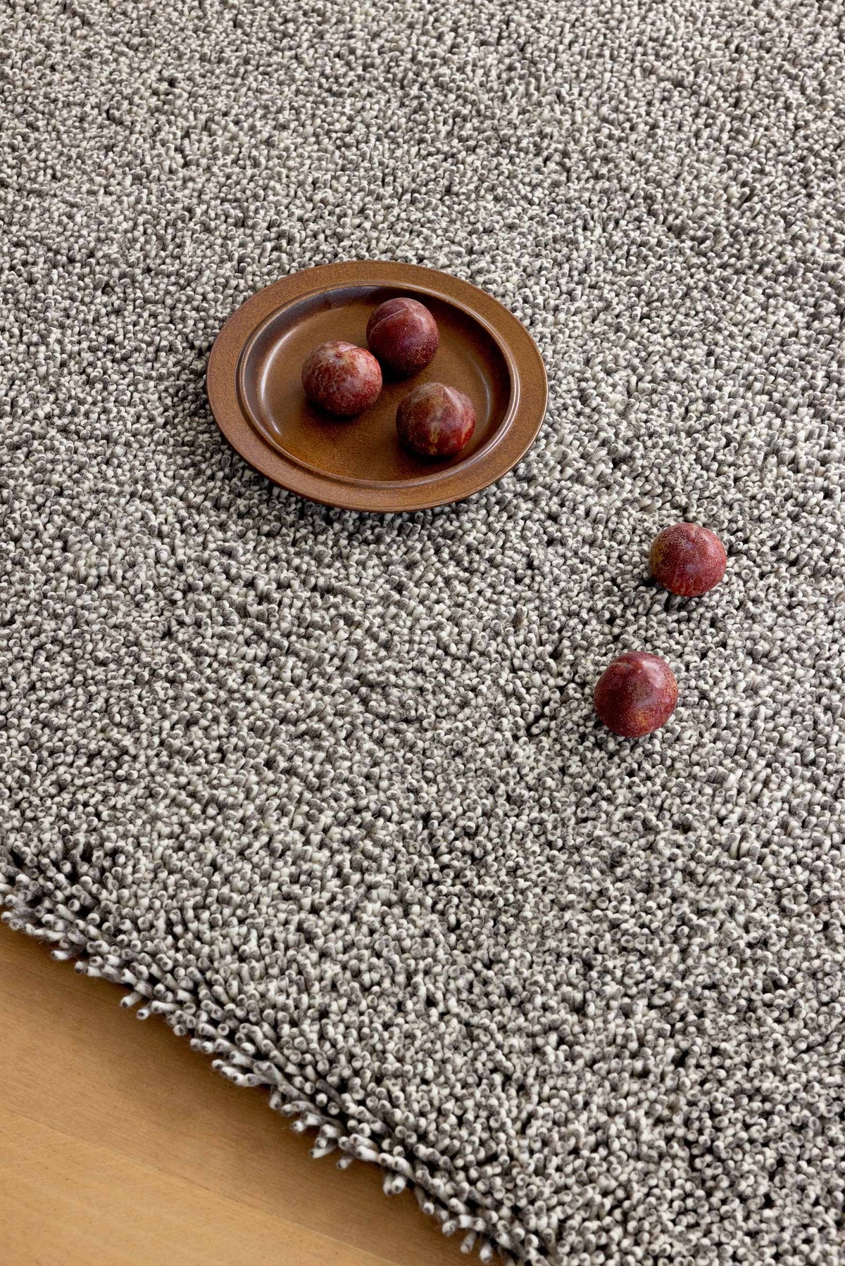 Brink & Campman Origin High Stone vloerkleed in een interieur