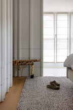 Brink & Campman Origin High Stone vloerkleed in een interieur