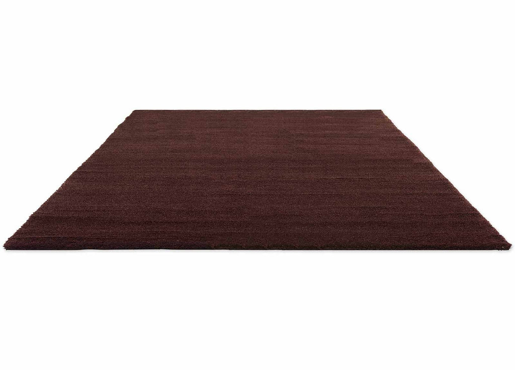 Brink & Campman Shade Low Plum/Fig vloerkleed schuin van boven