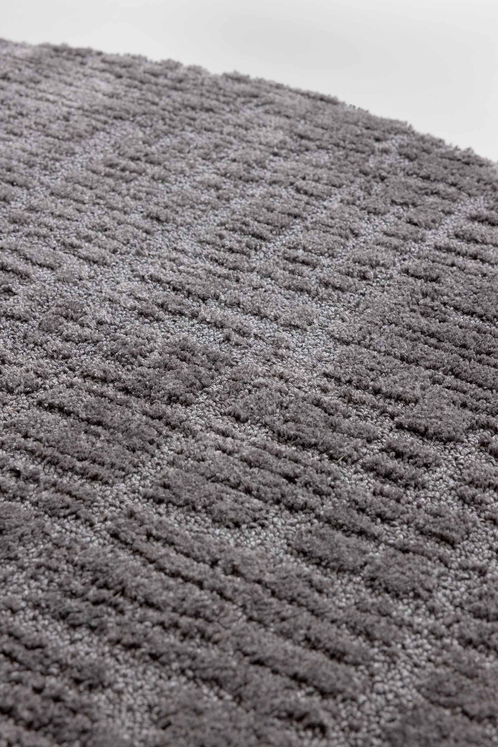 Brink & Campman Twinset Urban Graphite vloerkleed in een interieur