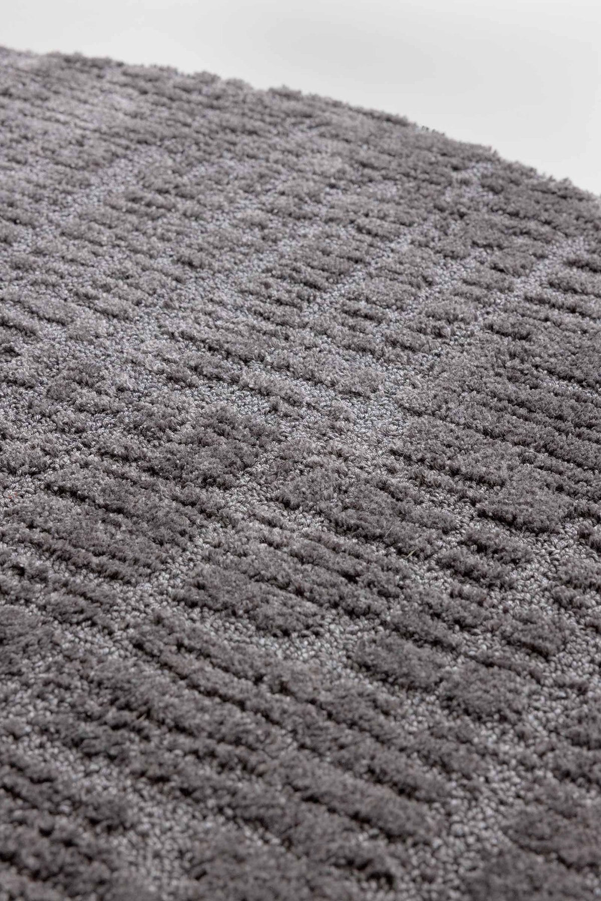 Brink & Campman Twinset Urban Graphite vloerkleed in een interieur