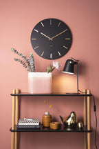 Karlsson wandklok Charm, zwart, sfeerfoto in interieur