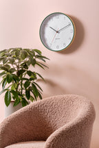 Karlsson wandklok Joy, hout groen, sfeerfoto in interieur