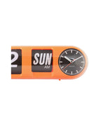 Karlsson flipklok Tube Flip, oranje, detail: sUN AM en analoge klok met Karlsson-logo