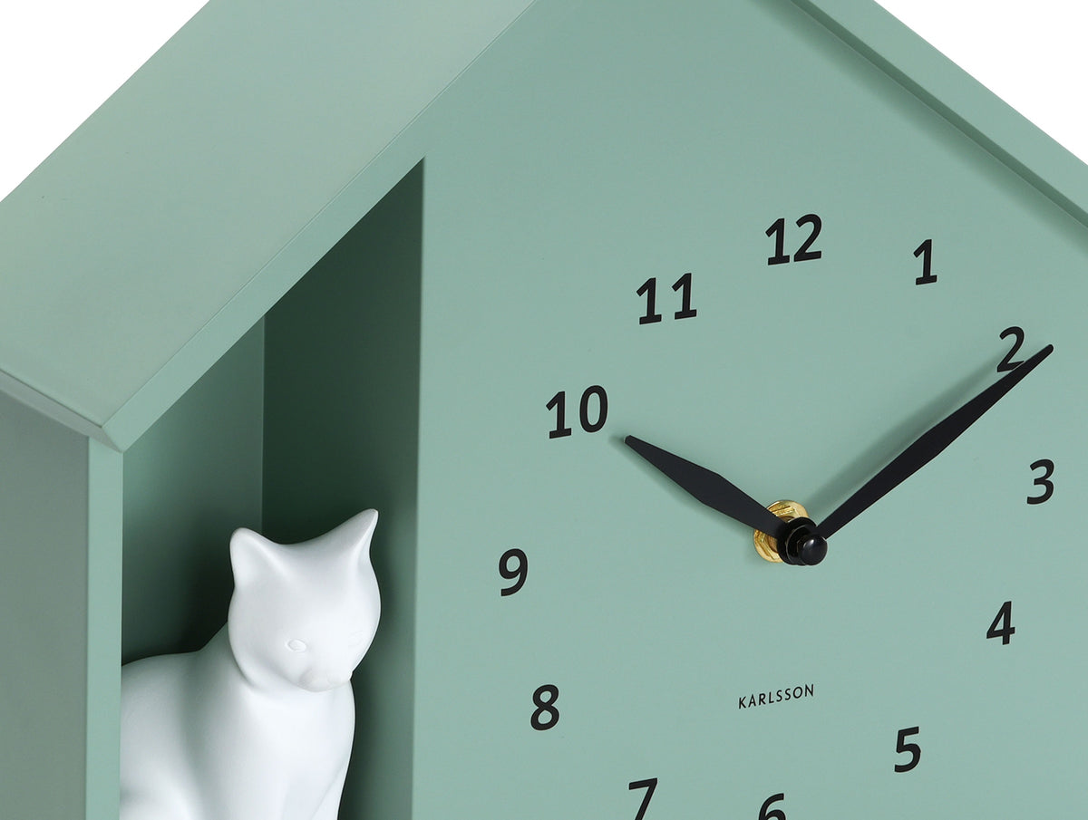 Karlsson wandklok Sitting Cat, groen, detail: witte kat en wijzers
