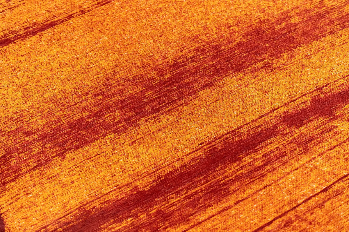 Close-up van het dessin van het Louis de Poortere Craft Brush 2061 Orange vloerkleed