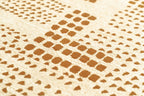 Close-up van het dessin van het Louis de Poortere Craft Zen Garden 2079 Dryed Banana vloerkleed