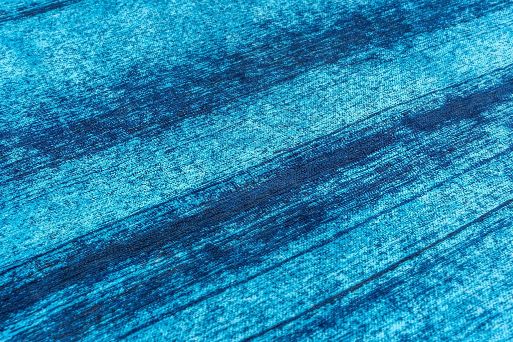 Close-up van het dessin van het Louis de Poortere Craft Brush 2080 Diva Blue vloerkleed