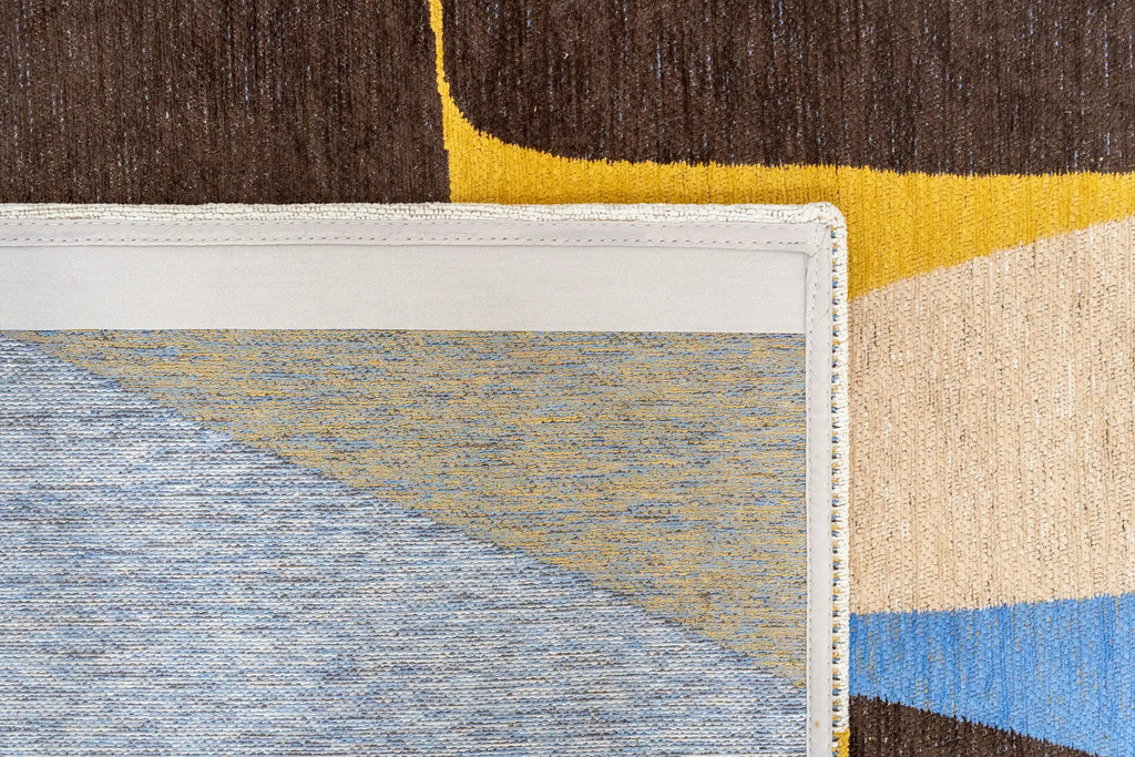 Close-up van het dessin van het Louis de Poortere Gallery Stones 2085 Sunny Blue vloerkleed