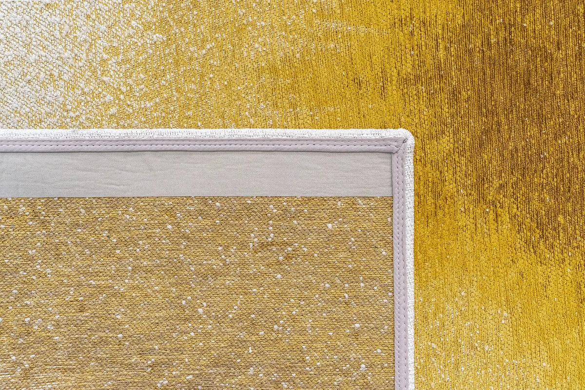 Close-up van het dessin van het Louis de Poortere Meditation Drop 2100 Gold Moss vloerkleed