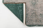 Achterkant van het Louis de Poortere Fading World Medallion 8259 Jade Oyster vloerkleed