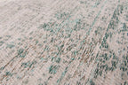 Close-up van het dessin van het Louis de Poortere Fading World Medallion 8259 Jade Oyster vloerkleed
