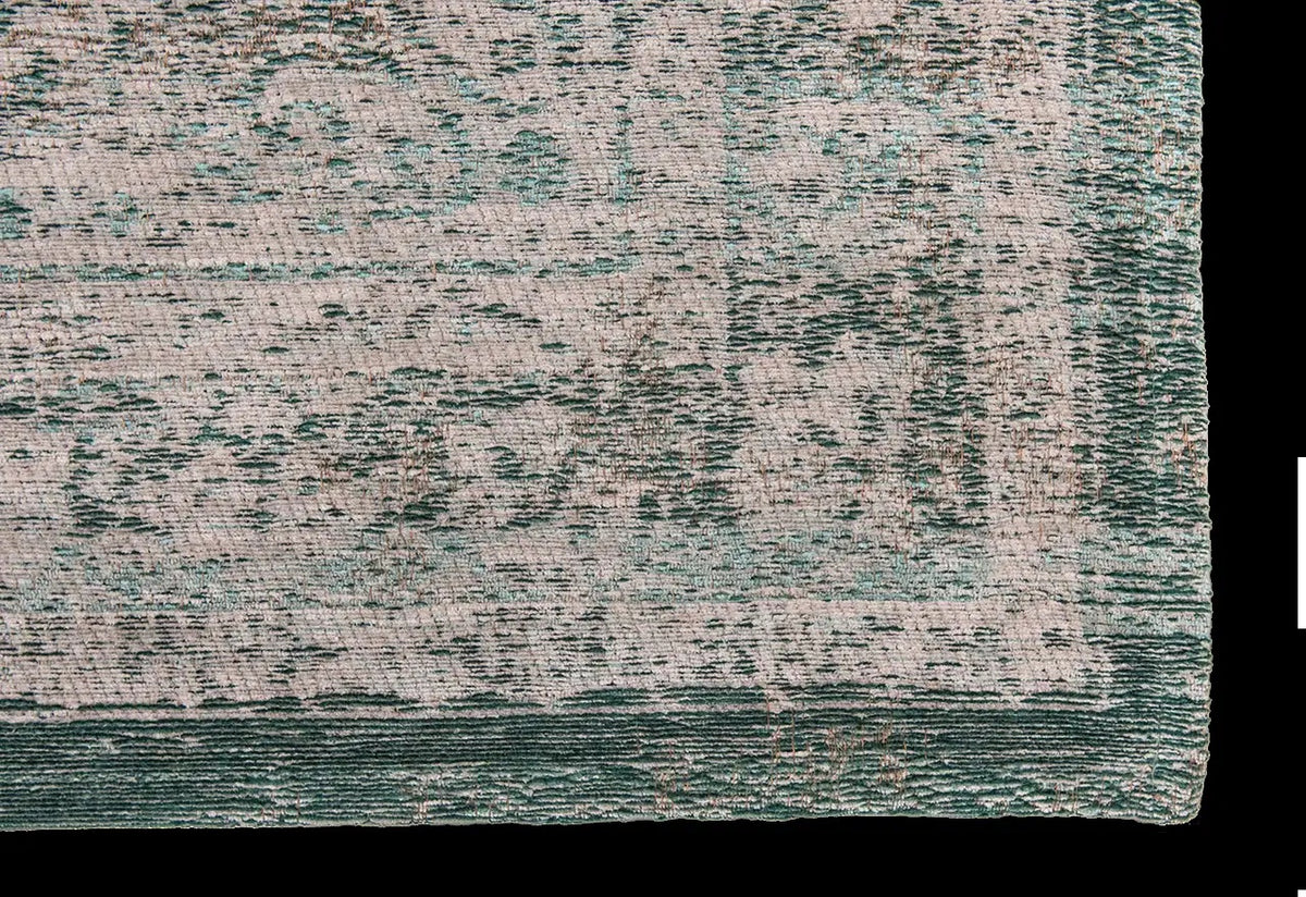 Louis de Poortere Fading World Medallion 8259 Jade Oyster vloerkleed met een plooi, dun en soepel