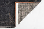 Achterkant van het Louis de Poortere Fading World Medallion 8263 Mineral Black vloerkleed