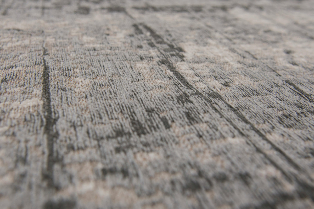 Close-up van het dessin van het Louis de Poortere Mad Men Griff 8420 Jersey Stone vloerkleed