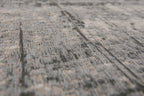 Close-up van het dessin van het Louis de Poortere Mad Men Griff 8420 Jersey Stone vloerkleed