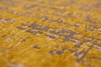 Close-up van het dessin van het Louis de Poortere Mad Men Griff 8550 Liberty Gold vloerkleed