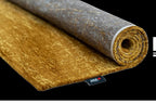 Louis de Poortere Mad Men Griff 8550 Liberty Gold vloerkleed met een plooi, dun en soepel