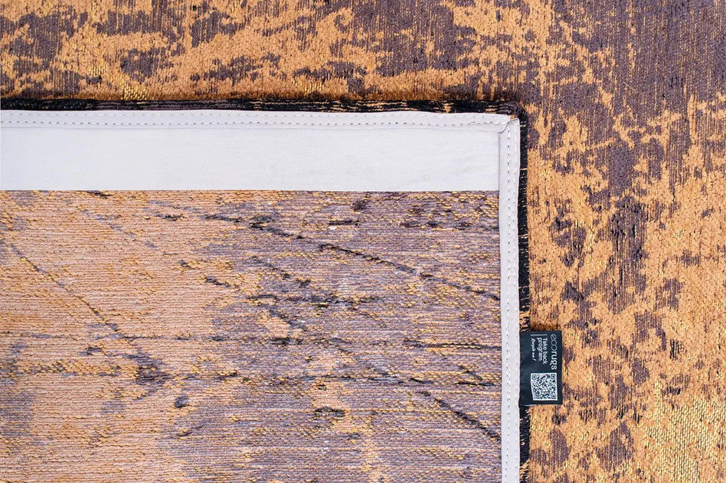 Close-up van het dessin van het Louis de Poortere Mad Men Cracks 8618 Deep Mine vloerkleed