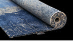 Louis de Poortere Mad Men Cracks 8629 Abyss Blue vloerkleed met een plooi, dun en soepel