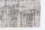 Zijaanzicht van het Louis de Poortere Atlantic Streaks 8716 Coney Grey vloerkleed