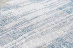 Close-up van het dessin van het Louis de Poortere Atlantic Streaks 8718 Long Island Blue vloerkleed
