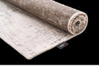 Louis de Poortere Mad Men Griff 8785 Concrete Jungle vloerkleed met een plooi, dun en soepel