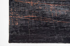 Zijaanzicht van het Louis de Poortere Mad Men Griff 8925 Soho Copper vloerkleed