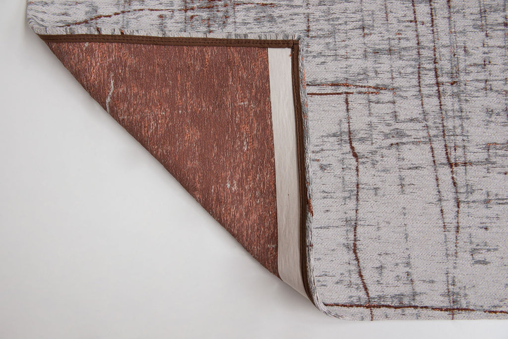 Achterkant van het Louis de Poortere Mad Men Griff 8956 Copperfield vloerkleed