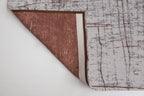 Achterkant van het Louis de Poortere Mad Men Griff 8956 Copperfield vloerkleed