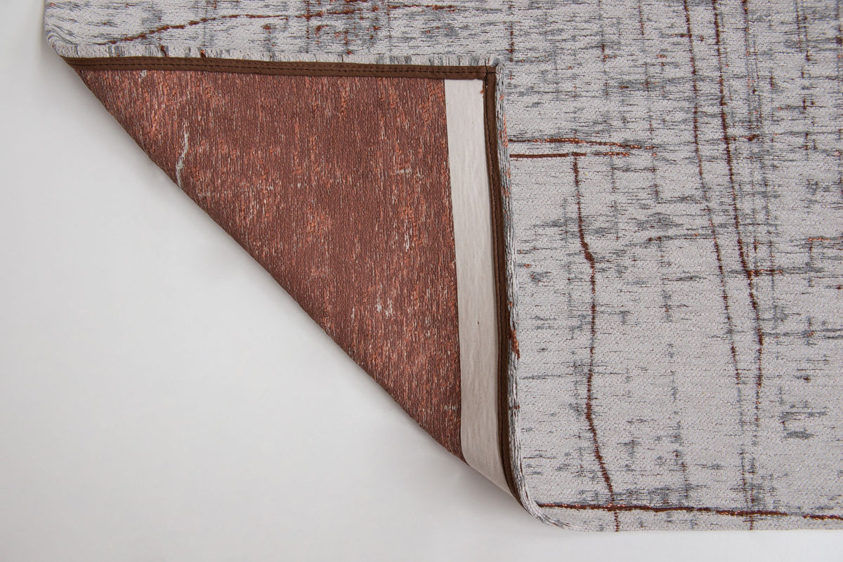 Achterkant van het Louis de Poortere Mad Men Griff 8956 Copperfield vloerkleed