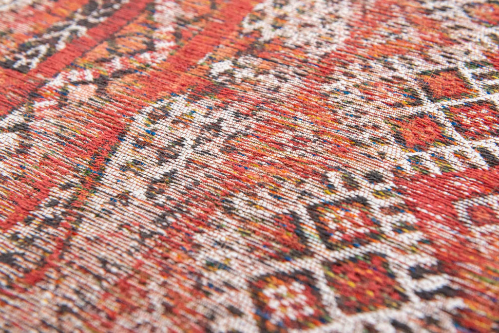 Close-up van het dessin van het Louis de Poortere Antiquarian Kilim 9115 Fez Red vloerkleed