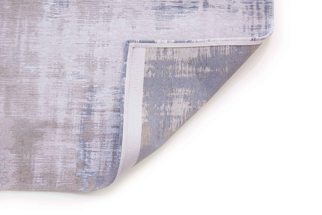 Achterkant van het Louis de Poortere Atlantic Venetian Dust 9195 Padua Beige vloerkleed