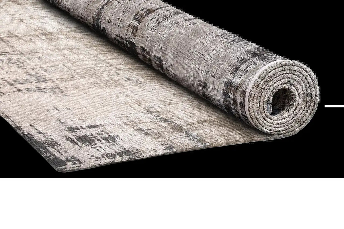 Louis de Poortere Atlantic Venetian Dust 9195 Padua Beige vloerkleed met een plooi, dun en soepel