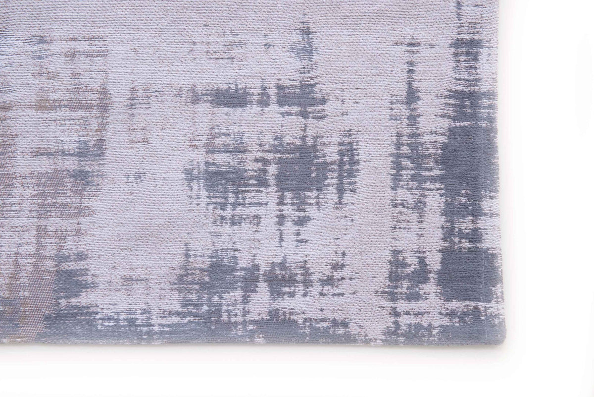 Zijaanzicht van het Louis de Poortere Atlantic Venetian Dust 9195 Padua Beige vloerkleed