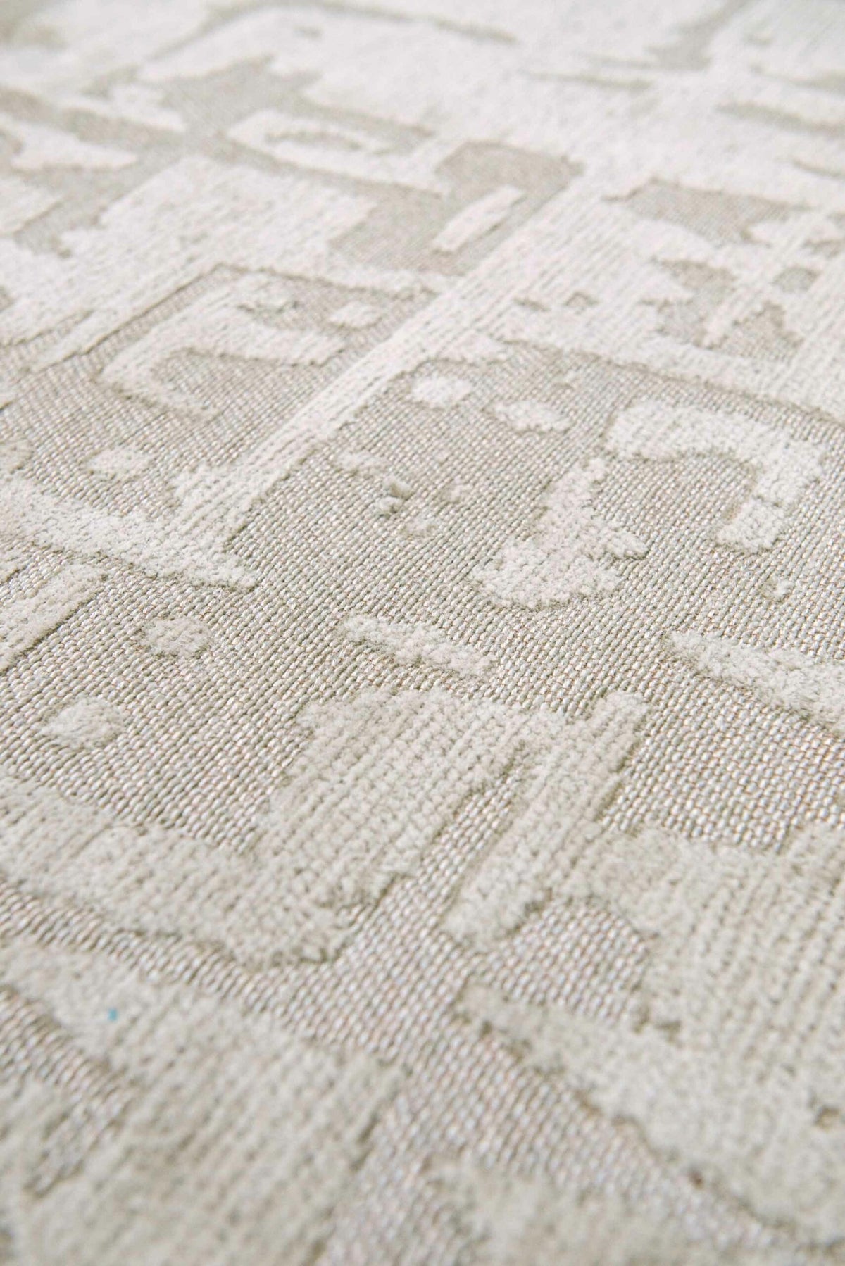 Close-up van het dessin van het Louis de Poortere Structures Baobab 9197 Dry Beige vloerkleed