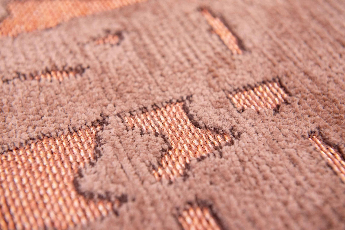 Close-up van het dessin van het Louis de Poortere Structures Baobab 9199 Za Copper vloerkleed