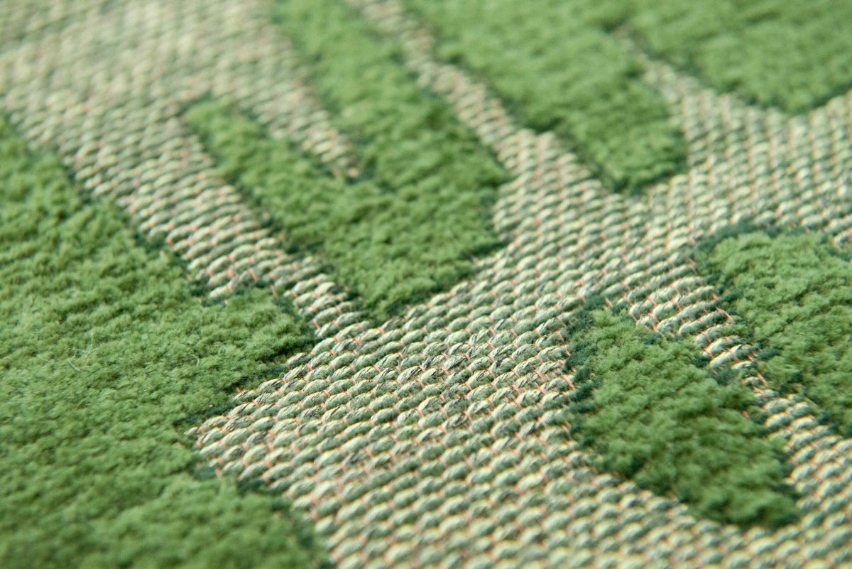 Close-up van het dessin van het Louis de Poortere Structures Baobab 9202 Perrier's Green vloerkleed