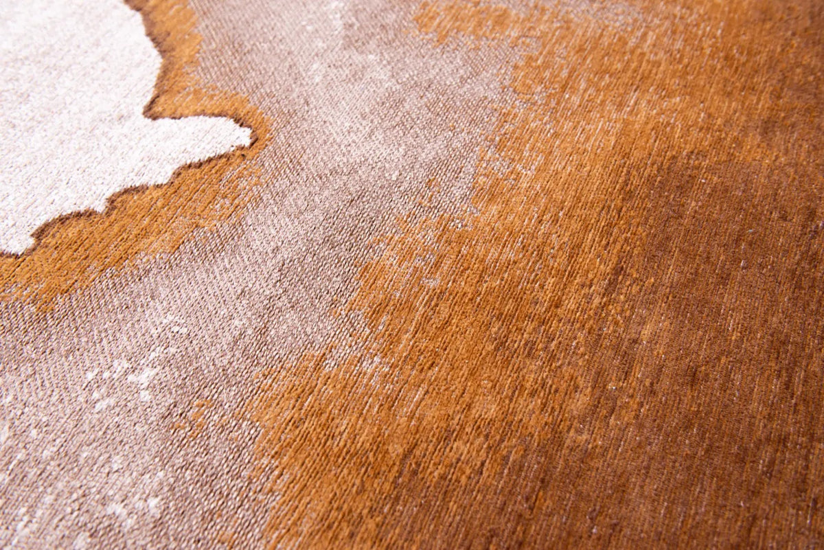 Close-up van het dessin van het Louis de Poortere Meditation Lagoon 9326 Chestnut vloerkleed