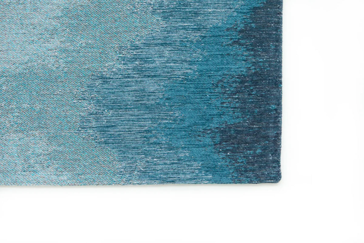 Zijaanzicht van het Louis de Poortere Meditation Lagoon 9332 Inkjet vloerkleed