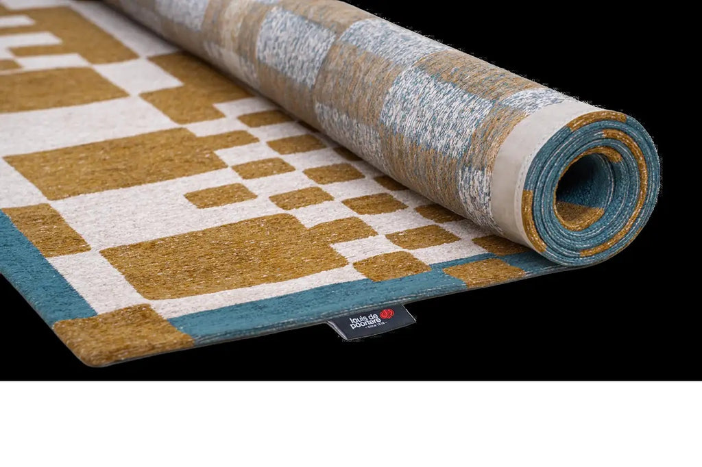 Louis de Poortere Craft Chess 9338 Honey vloerkleed met een plooi, dun en soepel