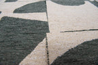 Close-up van het dessin van het Louis de Poortere Craft Papercut 9361 Sea Spray vloerkleed