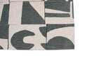 Zijaanzicht van het Louis de Poortere Craft Papercut 9361 Sea Spray vloerkleed
