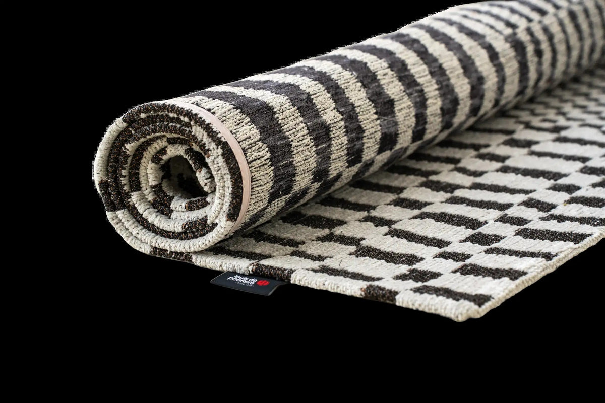 Louis de Poortere Structures Berber 9651 Caidal vloerkleed met een plooi, dun en soepel