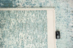 Close-up van het dessin van het Louis de Poortere Mad Men Virgin Land 9656 Neptune vloerkleed