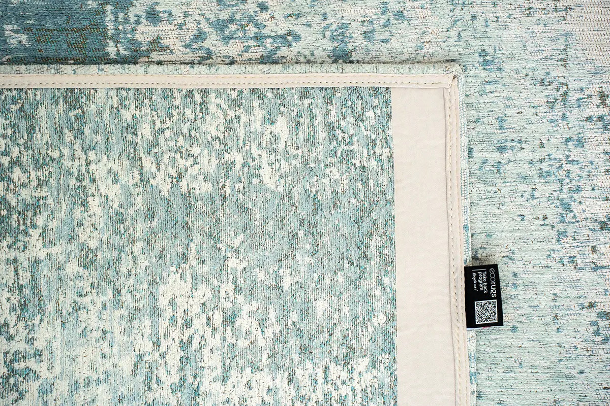 Close-up van het dessin van het Louis de Poortere Mad Men Virgin Land 9656 Neptune vloerkleed