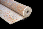 Louis de Poortere Antiquarian Ushak 9836 Galata Sunset vloerkleed met een plooi, dun en soepel